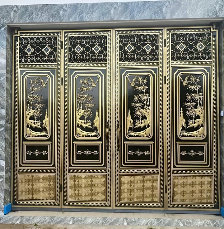 Mẫu cổng nhôm đúc hoa lá hiện đại